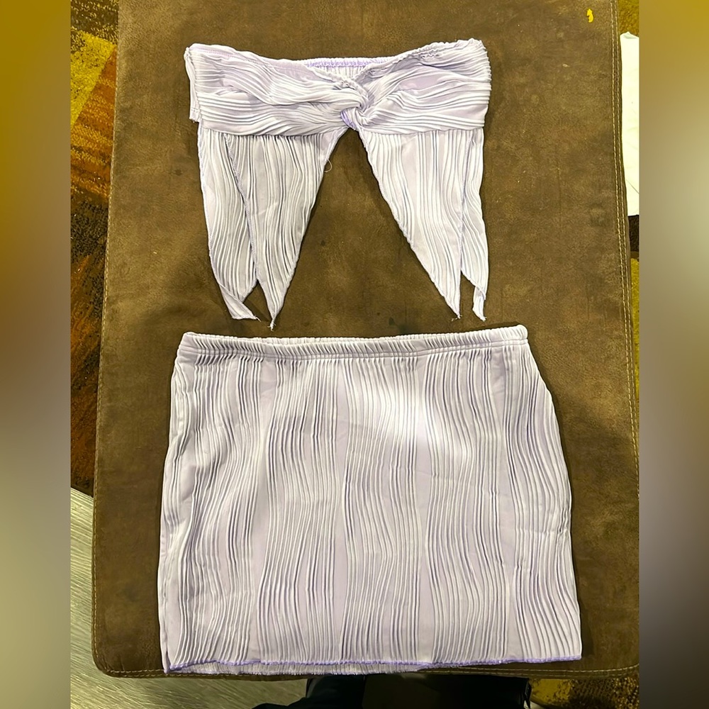 Purple two piece skirt and half top size large never worn